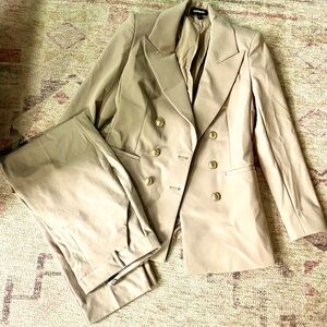 Brand new suit by Express size Small